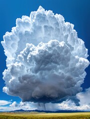 Naklejka premium Dramatic Cloud Formation Over Lush Green Landscape in Bright Sky