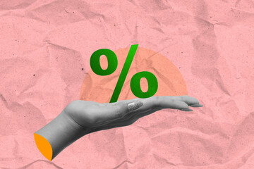 The human hand shows a percentage symbol
