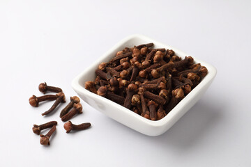 Clove spice, a small bowl of cloves