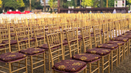 Empty decorative chairs in wedding party plot.