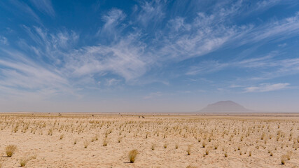 A breathtaking Namibian landscape with a dramatic cloud-filled sky