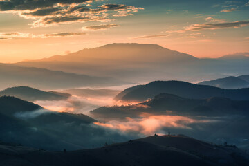 Golden sunrise shining over Doi Inthanon and foggy mountain on harvest season