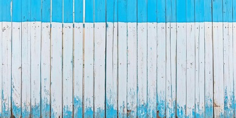 A horizontal view of a white wooden fence featuring blue paint and adorned with white rectangles, making it an excellent choice for wallpaper or background. Ideal for creative projects focusing on