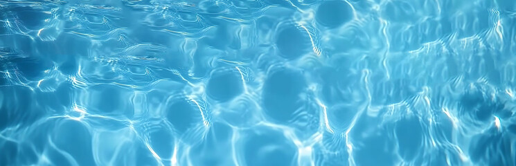 Blue clear water surface texture with ripples, splashes and bubbles. Abstract summer banner background Water waves in sunlight