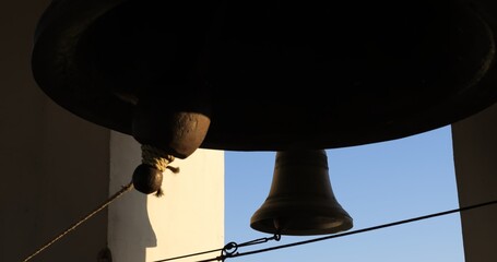 Bell ringing serves as powerful symbol that represents deep spiritual connections found within various religions and faiths, creating serene moments filled with sacred tranquility and divine sound