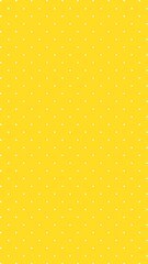 黄色背景に白のドットのキュートでシンプルな背景