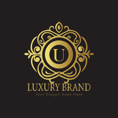 Letter U Luxury brand logo design with a royal gold crown emblem and elegant typography
