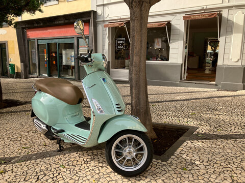 The Vespa Primavera is a scooter produced by Piaggio under the Vespa brand since 2013.in Italy. Seen here in Funchal, on the island of Madeira , Portugal 