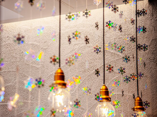 Light-hearted snowflakes, light bulbs and other decorations