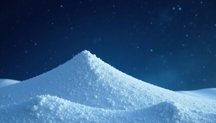 Naklejka premium Pure and untouched fluffy white snow mound isolated against dark night sky, solitude, dark