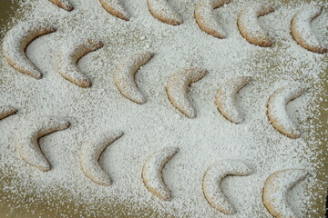 Homemade Vanillekipferl on parchment paper