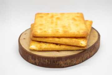 Biscuits on wood slice with white background
