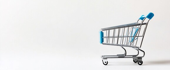 A metal shopping cart with blue handles on a minimalistic white background.