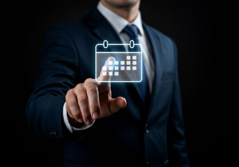 Professional businessman interacting with a virtual calendar icon, scheduling concept, modern technology, digital business planning, time management, and corporate innovation.
