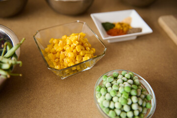 Healthy Cooking Ingredients Including Vegetables, Spices, and Grains on Display