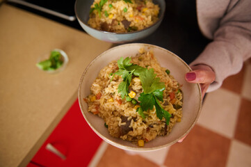 Delicious Bowl of Vegetable Paella Garnished With Fresh Parsley Ready to Enjoy