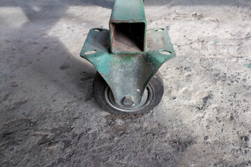 Iron Gate Wheel on Rough Concrete Surface