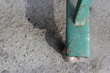 Iron Gate Wheel on Rough Concrete Surface