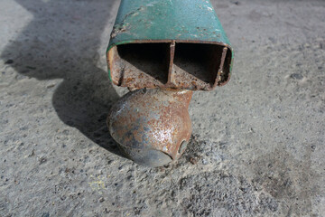 Iron Gate Wheel on Rough Concrete Surface