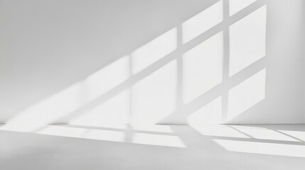 Fototapeta premium Bright Sunlight Casting Shadows on Empty Indoor Space with White Walls and Minimalistic Design