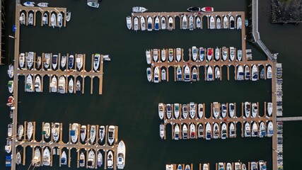 Aerial view of a busy marina with docked boats.