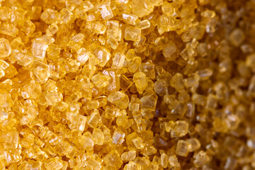 organic brown sugar crystals. close up. background