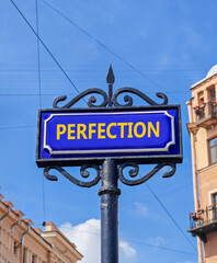 Obraz premium Perfection symbol. Concept word Perfection on beautiful blue road sign. Beautiful blue sky and city building background. Business perfection concept. Copy space.