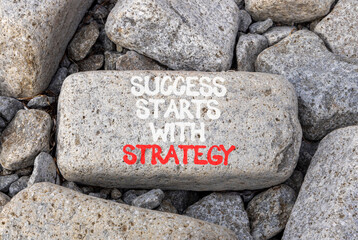 Success starts with strategy symbol. Concept words Success starts with strategy on beautiful grey...