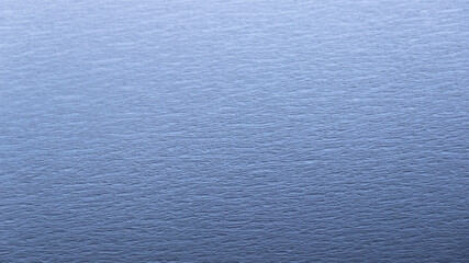 Blue background of embossed paper texture