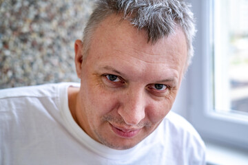 distorted face of sad and grieved very upset person, dissatisfied with his hard fate