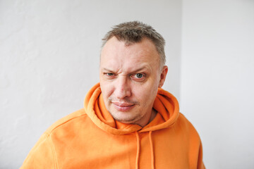 distorted face of sad and grieved very upset person, dissatisfied with his hard fate
