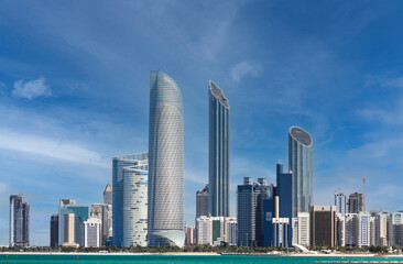 Abu Dhabi Skyline Before Sunrise: Night-to-Day Transition with Water Reflections