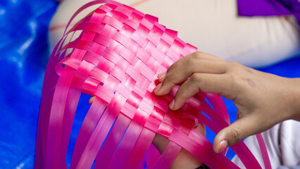 Create bags from woven plastic. Activities to reduce plastic waste