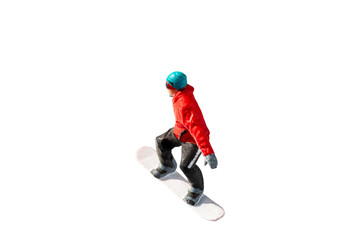 Obraz premium Miniature figurine depicting a snowboarder in mid-motion isolate on white background with clipping path