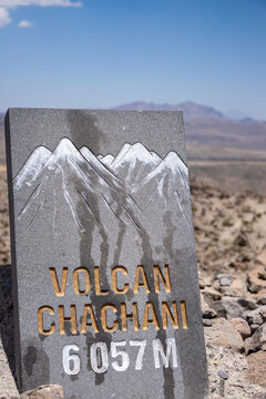 Signpost for Chachani Volcano at Mirador de los Volcanes in Peru surrounded by stunning highland scenery