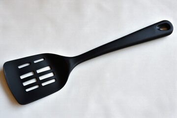 Black Plastic Kitchen Spatula with Holes
