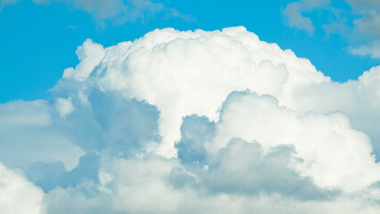 white cloud against blue sky
