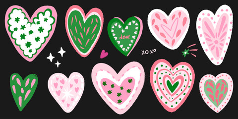 Fototapeta premium Hand drawn vector illustration set of colorful abstract heart shapes for design.
