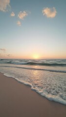 Fototapeta premium A pristine beach at sunset, tranquil ocean waves, water,sky,photography