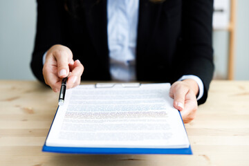 Businesswoman propose to sign contract