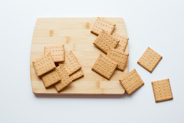 Crackers on Wooden Kitchen Board