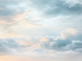 Obraz premium A cloudy gradient with soft blues, greys, and whites resembling a dreamy sky.