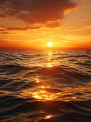 Fototapeta premium Golden ripples on the ocean surface during a breathtaking sunset, with warm orange tones illuminating the water. Generative AI