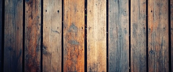 Naklejka premium Weathered vertical wooden planks background texture.