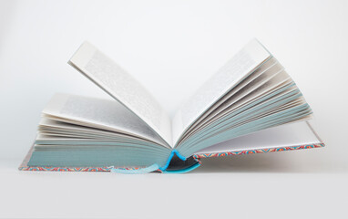 open book close up with bookmark