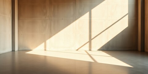 Fototapeta premium Empty Room with Sunlight Streaming Through Windows and Casting Diagonal Shadows on Concrete Walls and Floor