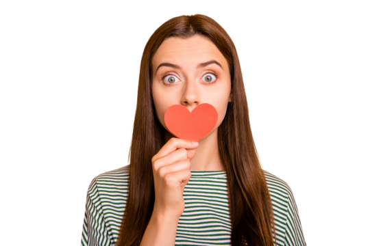 Close up photo of ashamed girl seeming to have told someone her secret while isolated with yellow background