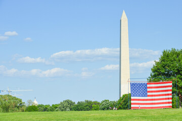 Washington Monument and giant United States National flag in Washington, D.C.