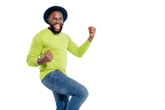 Portrait of cheerful man with closed eyes raising fists screaming shouting yeah  wearing eyeglasses eyewear isolated over white background