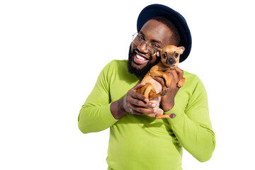 Portrait of cheerful guy hugging his toy terrier wearing eyeglasses eyewear isolated over white...